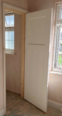 Open panelled door